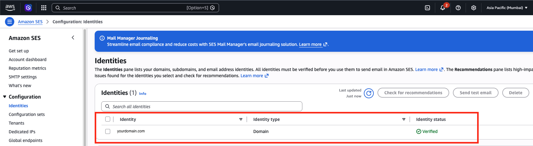 SES Identities list showing yourdomain.com with a green "Verified" status badge